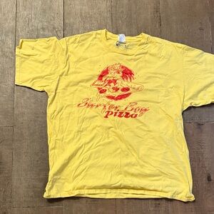 Stranger Things Surfer Boy Pizza Yellow Tee.  Men’s XL